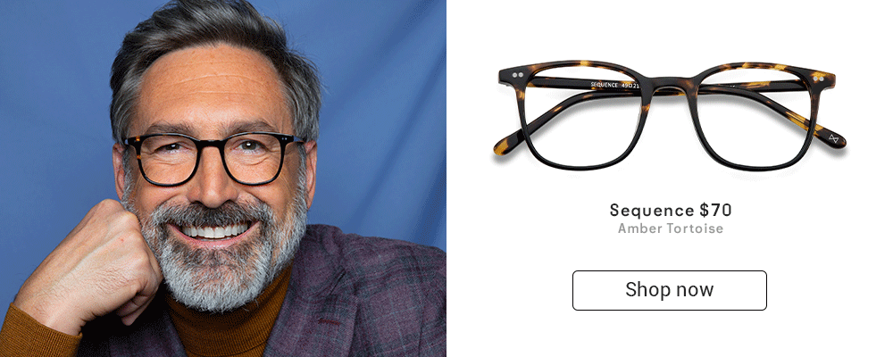 A man with gray hair wearing tortoiseshell eyeglasses