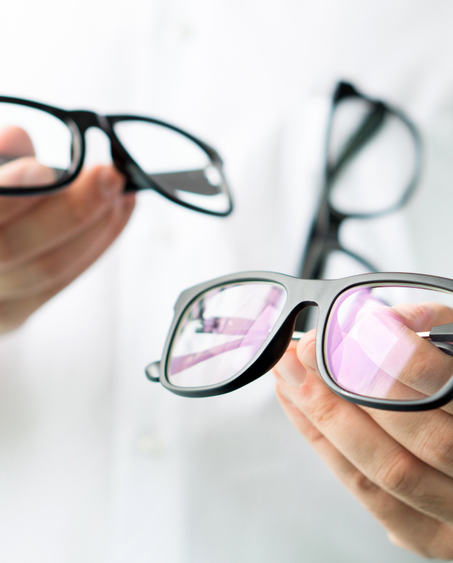 Two pairs of glasses with bifocal and progressive lenses